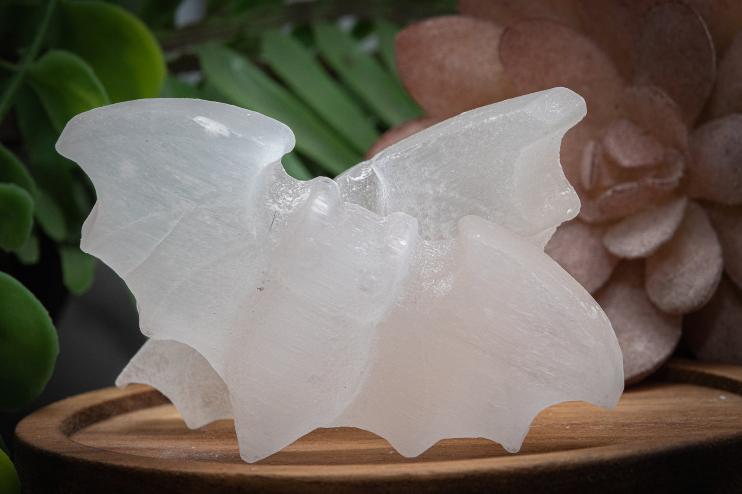 Selenite (satin spar) bat carving