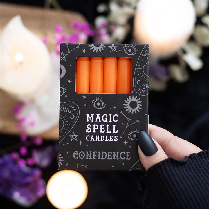 Pack of 12 orange 'CONFIDENCE' spell candles