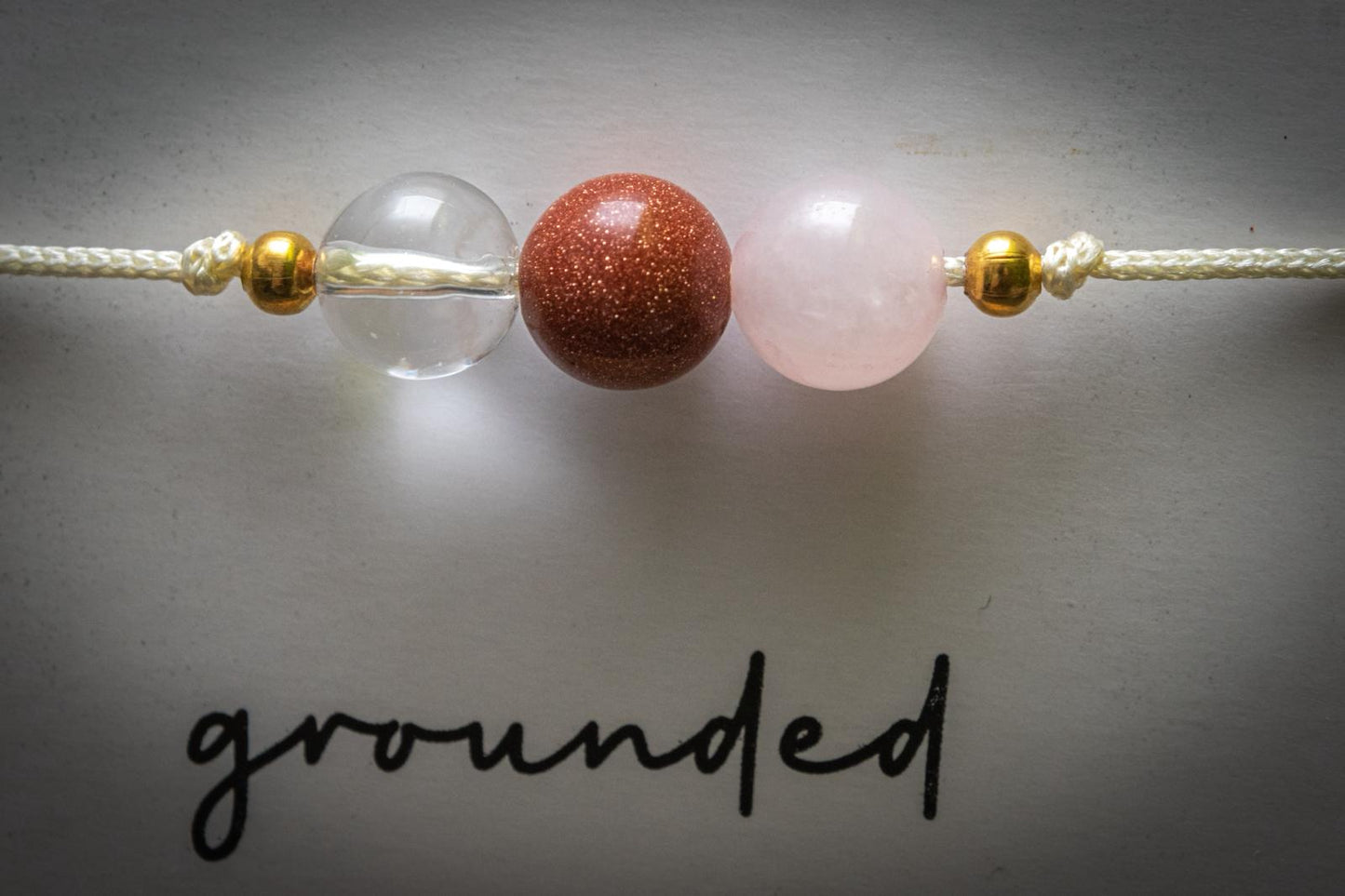 Grounded crystal intention adjustable corded bracelet - Clear Quartz, Red Goldstone & Rose quartz