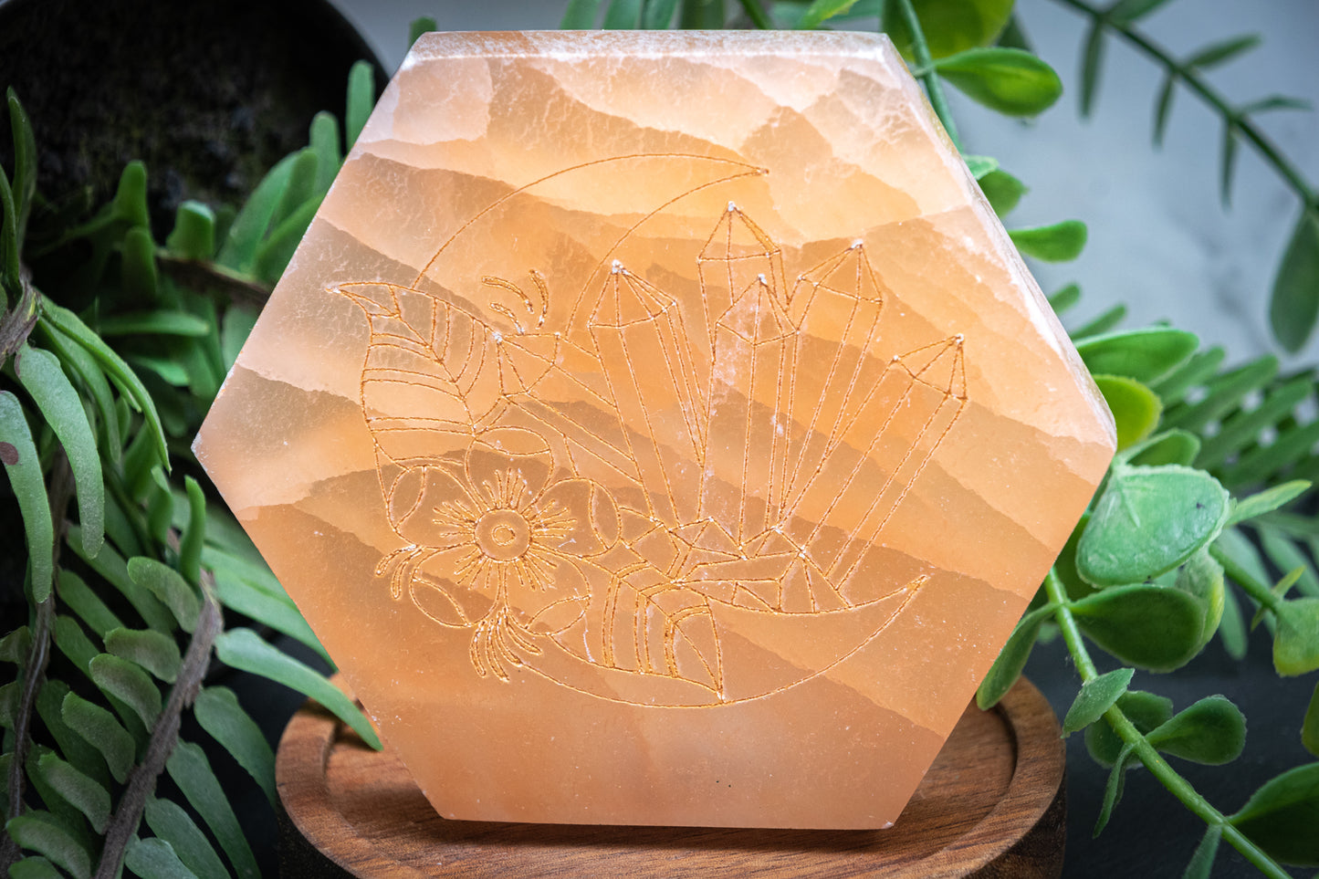 Orange selenite (satin spar) moon carving plate