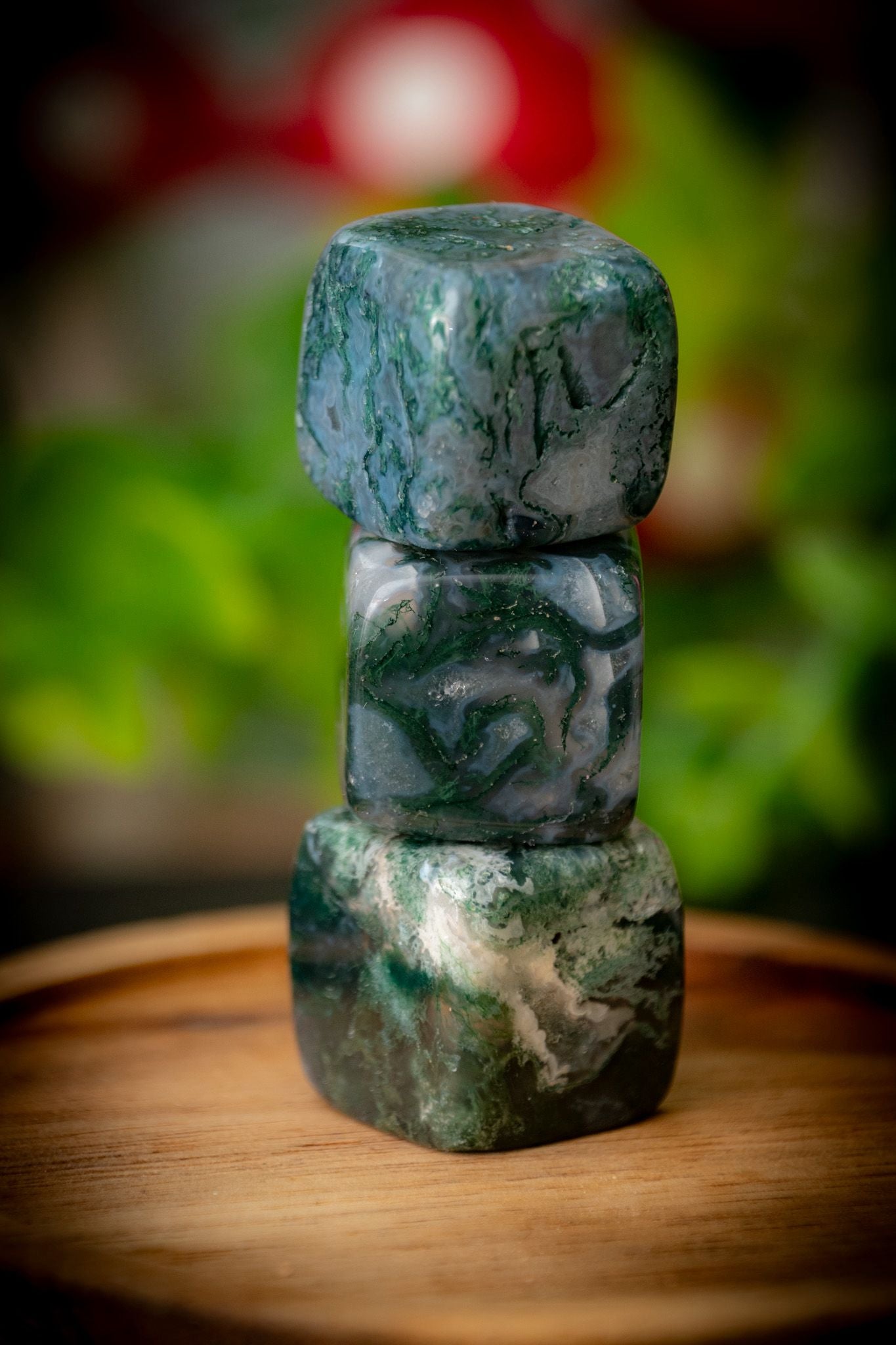 Moss agate cube carving