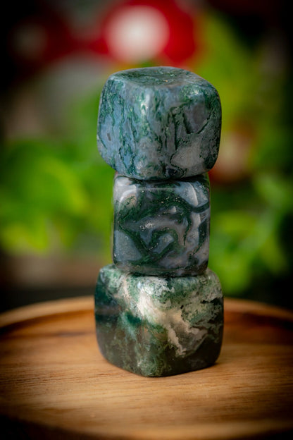 Moss agate cube carving