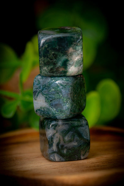 Moss agate cube carving