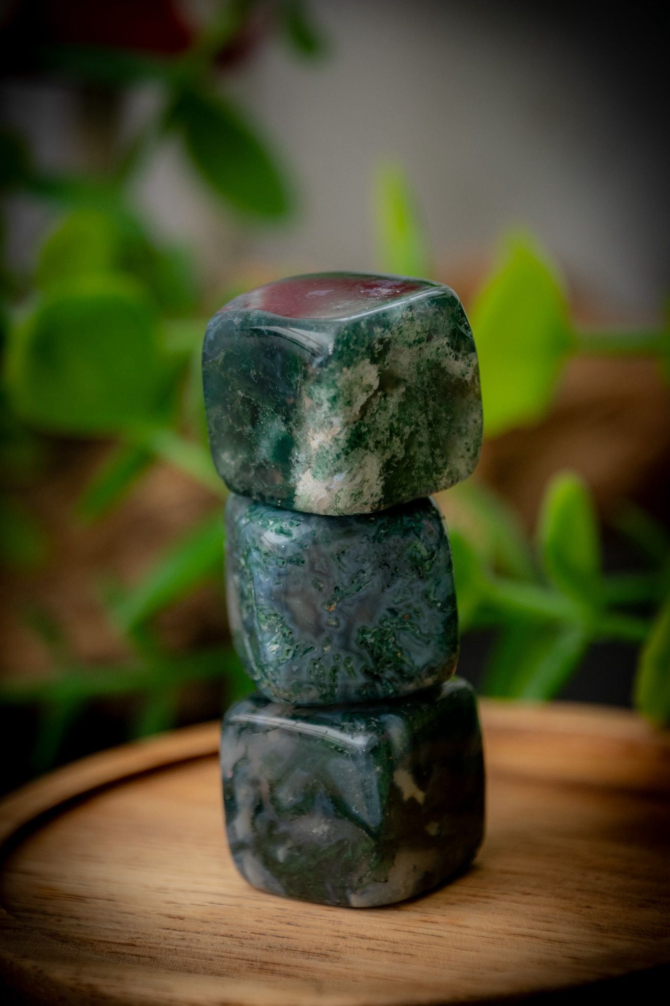 Moss agate cube carving