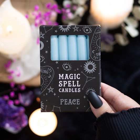 Pack of 12 light blue 'PEACE' spell candles