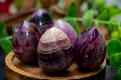 Rainbow fluorite egg carving